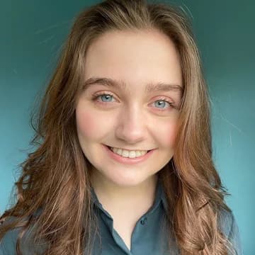 Bridesmaid: a woman with long light-brown wavy hair in a teal button-down shirt against a flat teal background.